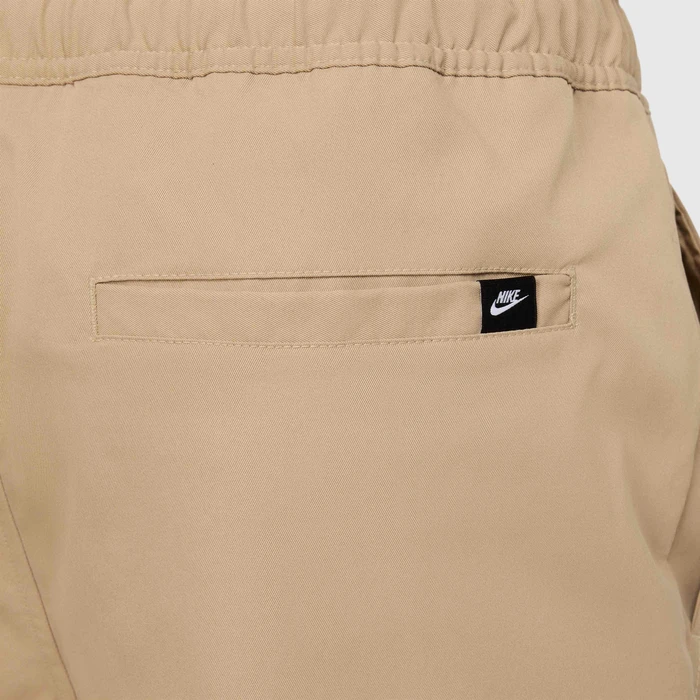 Брюки Nike M NK CLUB WVN TAPER PANT HJ1997-297 в Челябинске в Челябинске